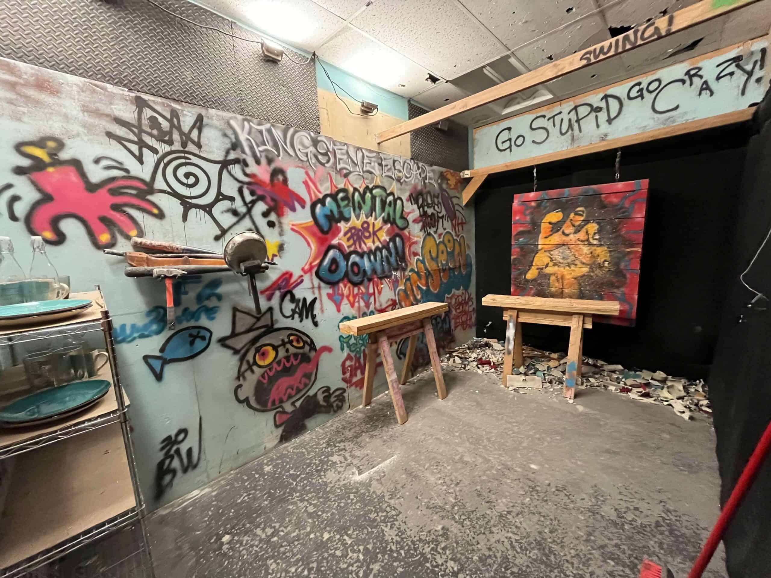 Escape room with vibrant graffiti walls and mysterious decor in Westminster CA.